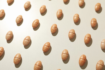 Flat lay with pills on gray background, close up