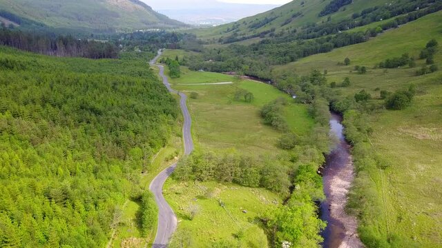 Aerial Footage of Glen Nevis road and river in Scotland