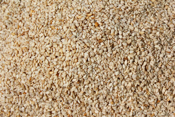 Heap of organic natural sesame seeds