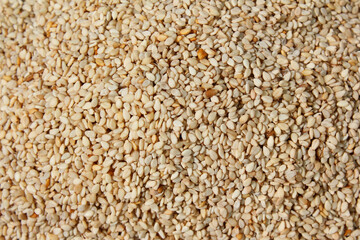 Heap of organic natural sesame seeds