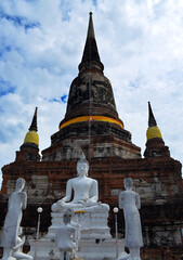 Fototapeta premium Ayutthaya, Thailand - Wat Yai Chaimongkhon Stupa & Statues