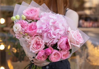 Colorful flowers assorted bouquet in bright paper