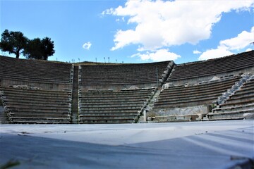 Theatre of The Asclepion of Pergamon Ancient City. Bergama, Izmir, Turkey. Relics, Roman columns, gates during sunny day and blue sky.