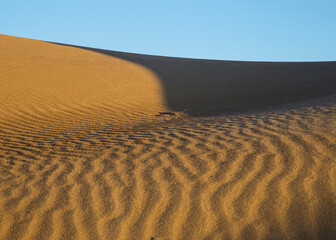 wave pattern on sand dunes in the desert.
Dasht-e Kavir, Iran.