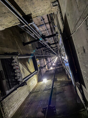 Looking up a lift (elevator) shaft in an apartment building © Hein van Tonder