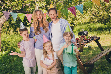 Portrait of nice attractive adorable cheerful gad full big family small little brother sister fatherhood motherhood friends friendship congrats festal sunny day occasion having fun fresh air picnic © deagreez