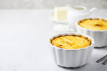 Millet rice bake in baking dishes. Space for text.
