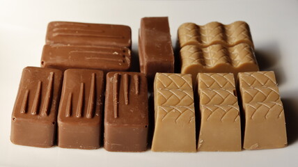 Black and white chocolate on a white background