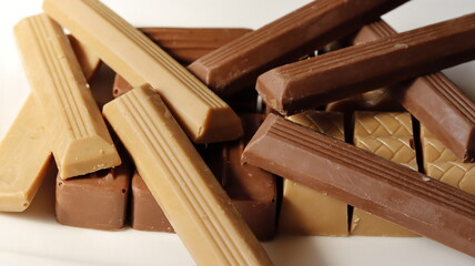 Black and white chocolate on a white background
