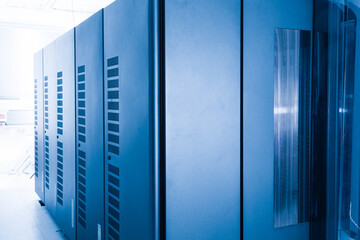 server cabinets inside data center room