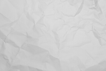 White crumpled paper texture background.