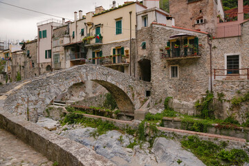 Zuccarello architectures and historical bridge, medieval town near Albenga, Liguria, Italy 