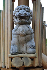 Close Up of Carved Decorative Wooden Chinese Lion Figure 