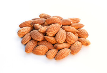 Group of dry almond nuts isolated on white background