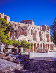 Obraz premium Parthenon and Acropolis walls over the arches of Heriodeion theater, Athens Greece