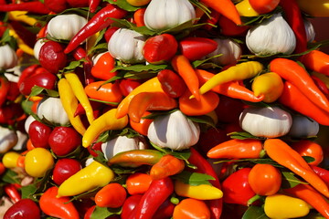A mixture of various fresh and hot peppers, garlic and other vegetables