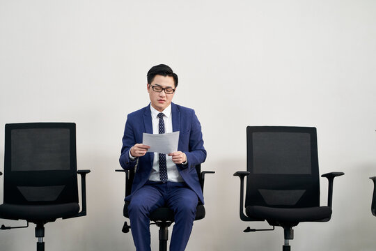 Young Asian Businessman Preparing For Job Interview