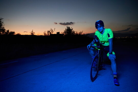 triathlon athlete portrait while resting on bike training © .shock