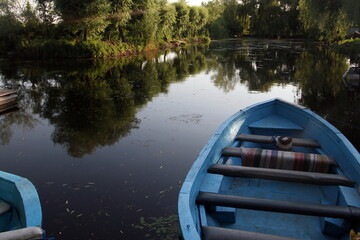 pleasure boat on the pier in the lake