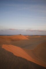 Fototapeta na wymiar Sand dunes photographed at sunset in the Maspalomas desert in Gran Canaria.