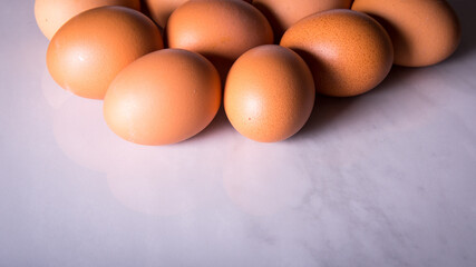 Close-up of fresh brown eggs ,side view,copy space,background,