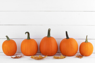 Pumpkins and autumn leaves