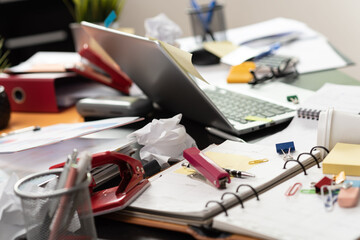 Messy and cluttered desk