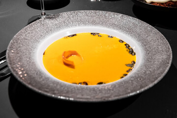 Pumpkin soup with seeds as decoration