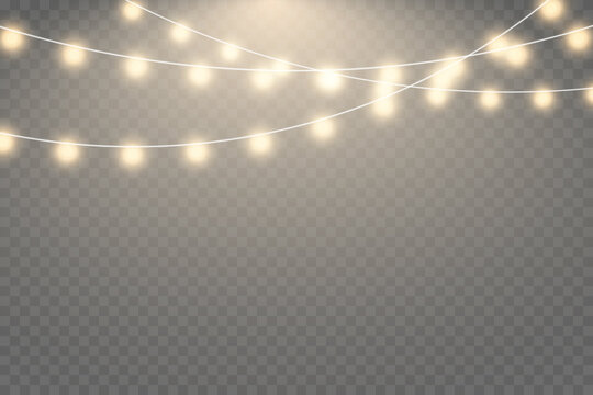 Christmas lights isolated on transparent background. Set of golden xmas glowing garland with sparks. © ellyson
