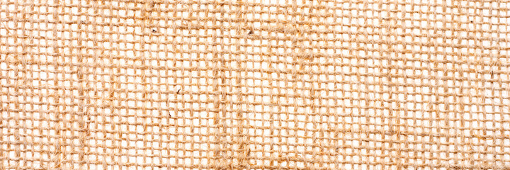 Woven brown burlap. Panoramic texture pattern background. Texture of sackcloth
