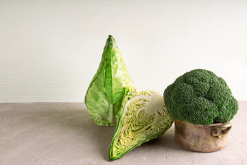 Fresh ripe pointed cabbage and broccoli assortment. Copy space.