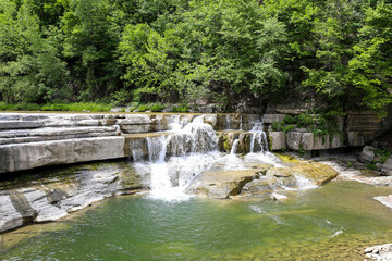 The little or lower falls at Taughannock Falls State Park. Taughannock creek view from the hiking trail in the summer.
