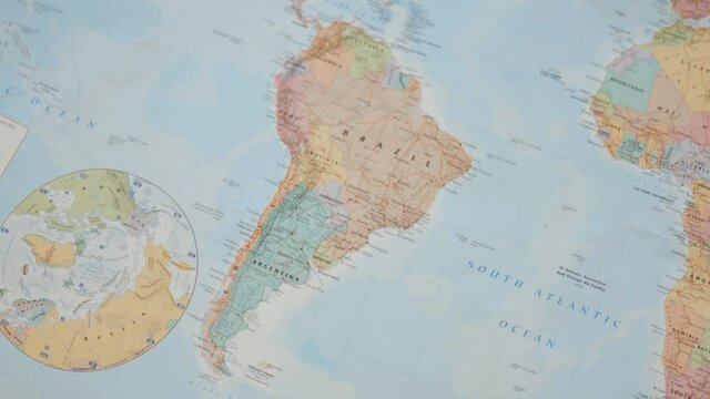 Circrling View of South America on a Colorful World Map