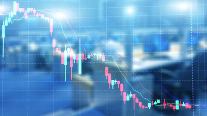 Blurred office with stock market falling graph