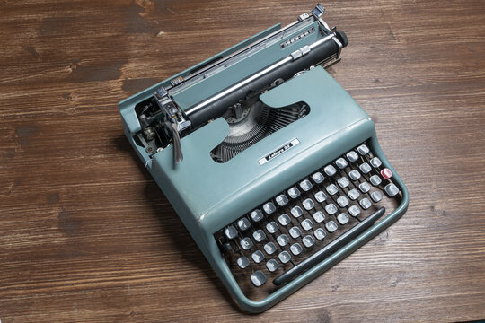 Udine, Italy. October 20, 2020. An old Olivetti typewriter, model letter 22 on a wooden table