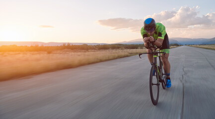 triathlon athlete riding a bike