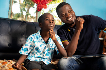 father and son smiling together