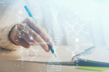 DNA theme hologram over woman's hands writing background. Concept of education. Double exposure