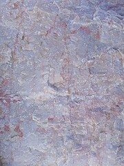 Full frame shot of violet facing tiles in the wall background 