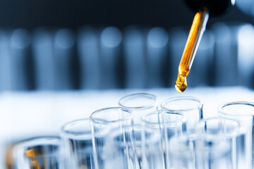 Test tube containing chemical liquid in laboratory, lab chemistry or science research and...