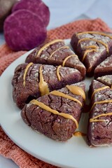 Purple sweet potato scones with peanut butter and pumpkin seed butter 