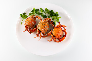 three crabs on a plate