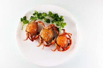 three crabs on a plate
