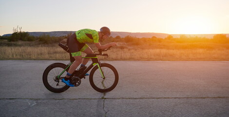 triathlon athlete riding a bike