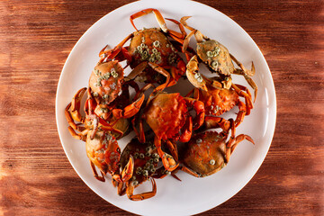 plate with boiled crabs and crab meat