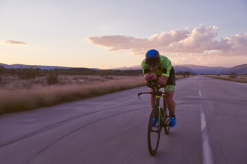 triathlon athlete riding a bike