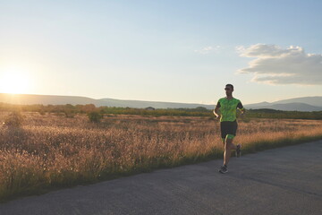 Obraz premium triathlon athlete running on morning trainig