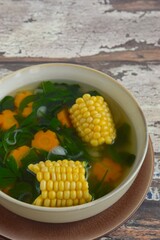 Sayur Bayam, Indonesian food. Spinach clear soup with sweet corn and carrot
