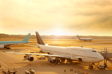 Commercial passengers airplanes at an airport.