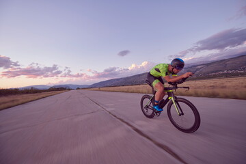 triathlon athlete riding a bike